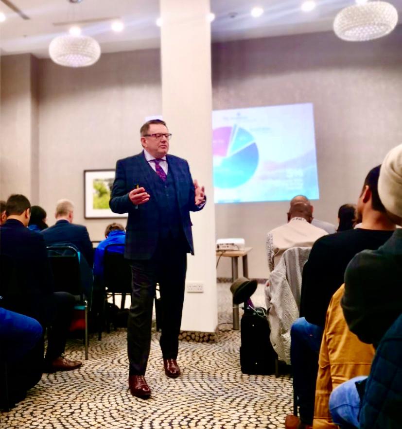 Ivan Smith presenting to a classroom