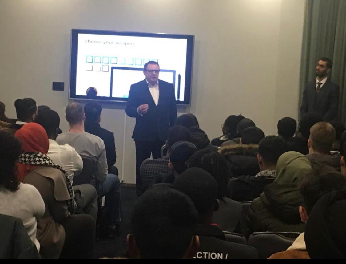 Foreign exchange education for a seated audience